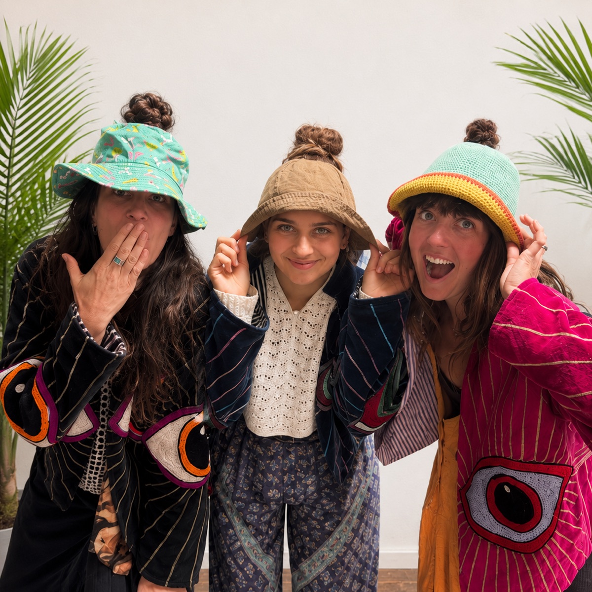 Three friends in HolyHats, buns out